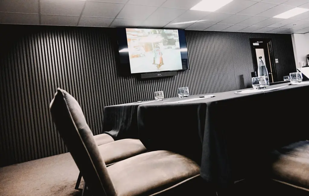 Table set up at McMenemy's Grimsby Town with TV in the background